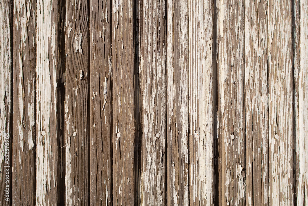 texture of old wooden slats with peeling paint