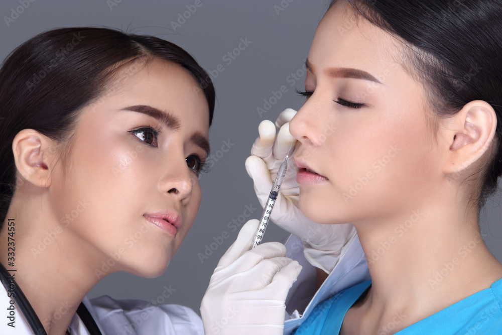 Beautician Doctor Check Diagnose Face structure patient before plastic surgery Beautician Doctor Check Diagnose Face structure patient before plastic surgery