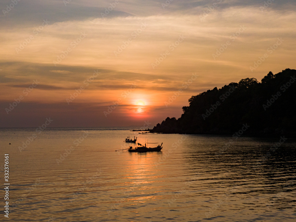 Fisherman orange sunset, Thailand island