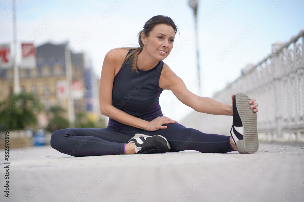 Fototapeta premium young woman doing fitness exercise