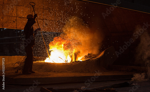Fotografie Smelting metal in a metallurgical plant.