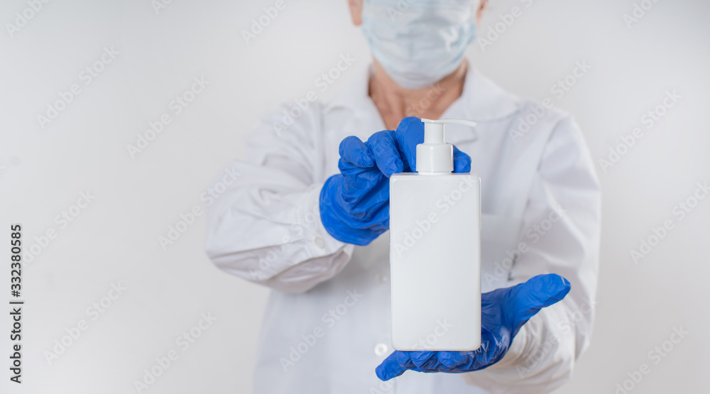 Sanitizer and liquid soap in the hands of a woman. Disinfection from viruses. Sanitizer and liquid soap in the hands of a woman. Disinfection from viruses.