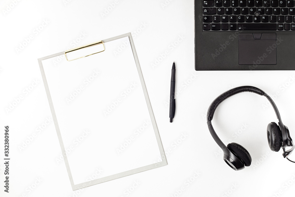 Top view of office desk. Table with laptop and office supplies. Flat lay home office workspace, remote work, distant learning, video conference, calls idea