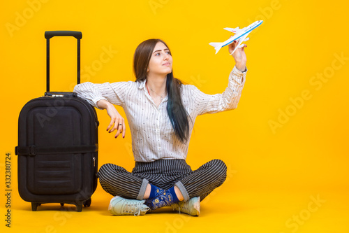 Airplane. Girl is playing w...
