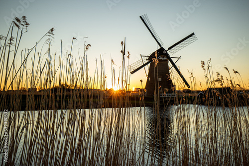 Windmills kinderdijk netherland during sunset