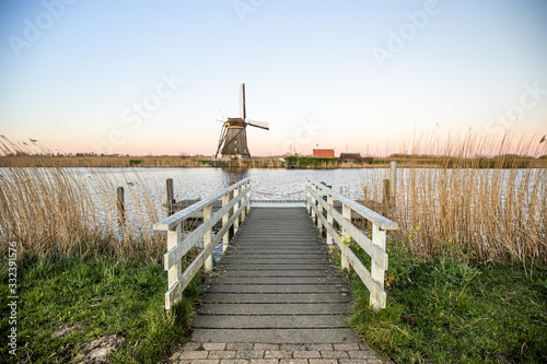 Windmills kinderdijk netherland during sunset
