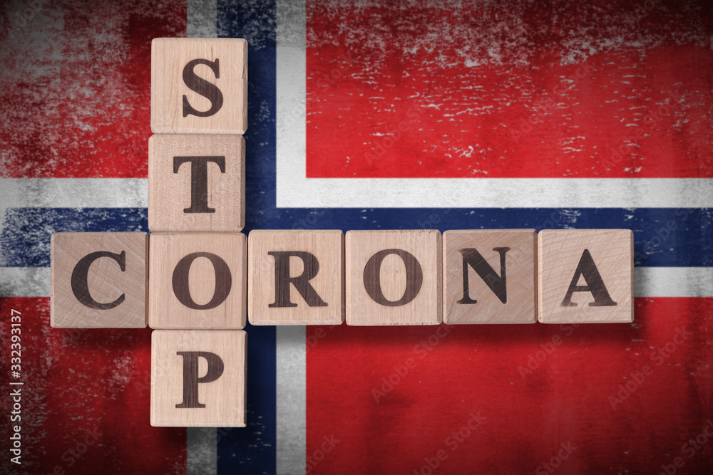 Flag of Norway with wooden cubes spelling STOP CORONA on it. 2019 - 2020 Novel Coronavirus (2019-nCoV) concept art, for an outbreak occurs in Norway.