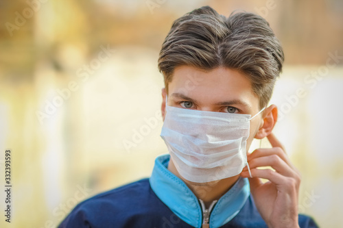 masked man from coronavirus and air. Protection against PM 2.5 air polluted from thea virus in Europe and Asia