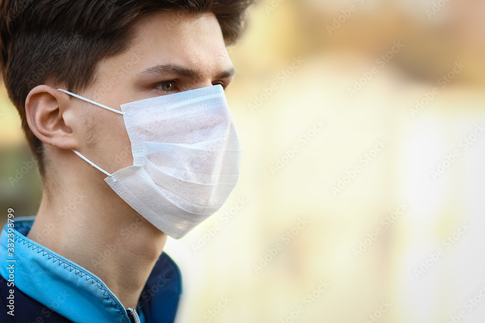 masked man from coronavirus and air. Protection against PM 2.5 air polluted from thea virus in Europe and Asia masked man from coronavirus and air. Protection against PM 2.5 air polluted from thea virus in Europe and Asia