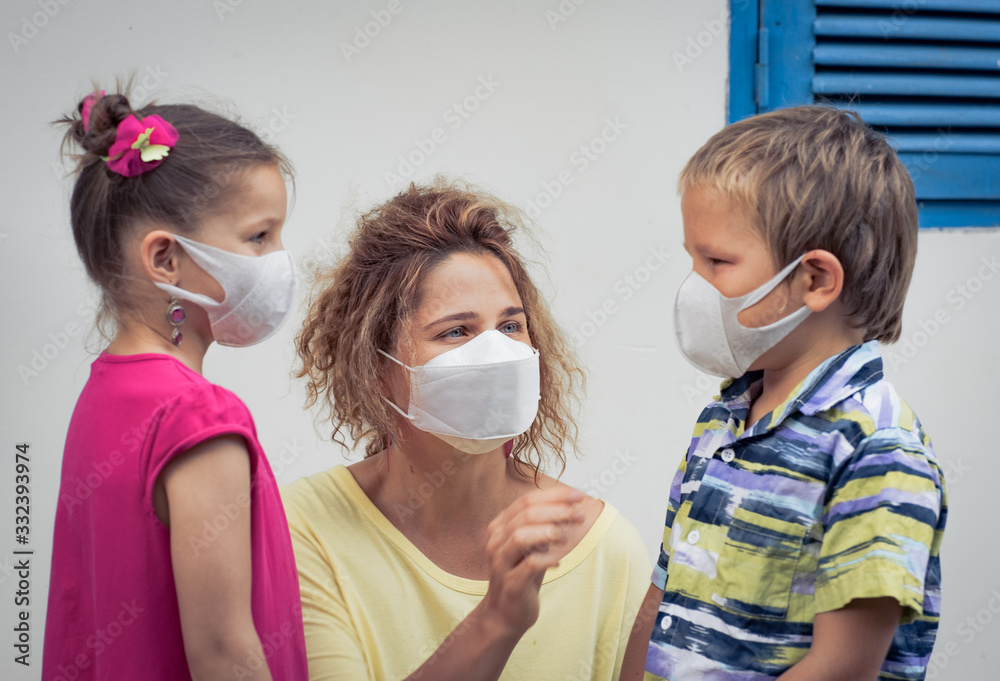 Family wearing facial disposable mask. Coronavirus protection