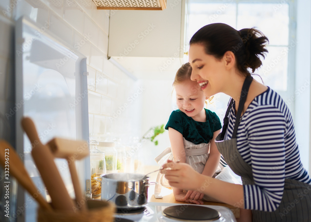 Happy family in the kitchen.