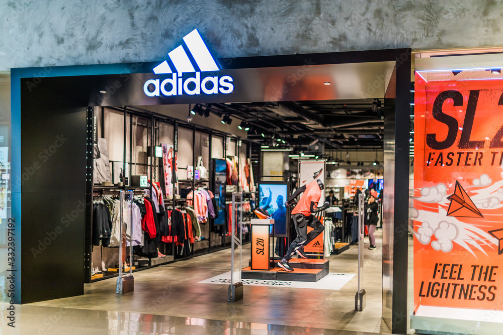 Front entrance to Adidas store in Singapore shopping mall Stock Photo |  Adobe Stock