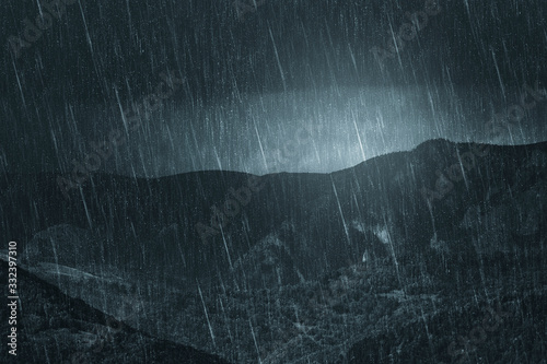 rainy weather dark landscape, mountain view during heavy rain