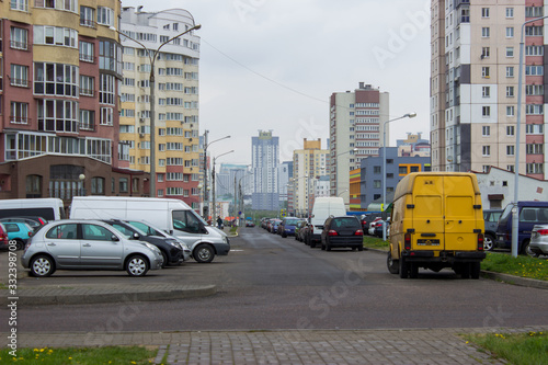 fragment of an urban environment with high-rise apartment buildings. © SVIATLANA
