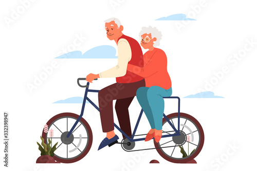 Old man and woman riding their colorful bicycle. Active outdoor life