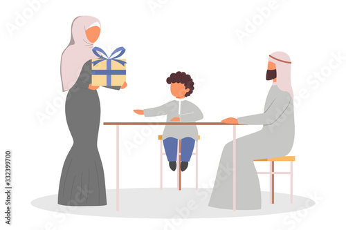 Happy arab family spend time together at home and giving gift