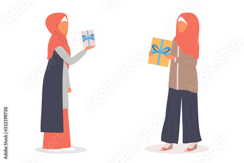 Muslim woman holding gift box. Arabian woman in different