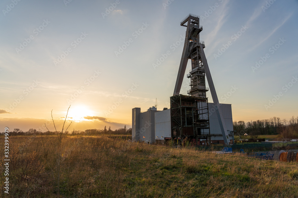 sunset over coal mine called zeche huge in gelsenkirchen germany sunset over coal mine called zeche huge in gelsenkirchen germany