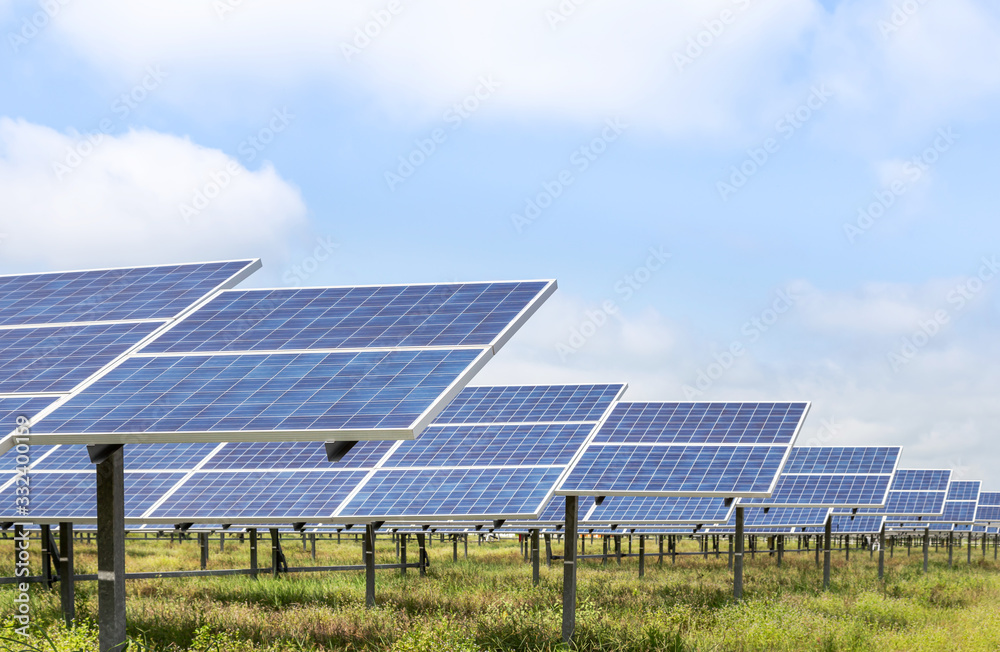 solar cells or photovoltaics in solar power station convert light energy from the sun into electricity alternative renewable clean energy efficiency from the sun