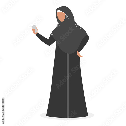 Muslim woman taking selfie. Arabic character taking photo of herself