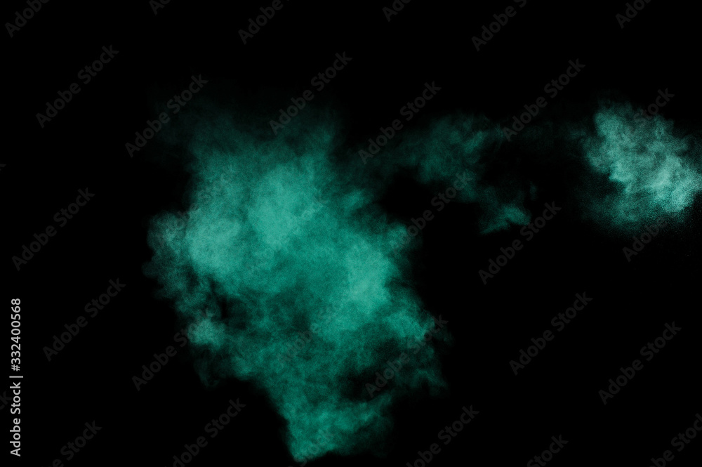 Aquamarine powder explosion on black background. Colored powder cloud. Colorful dust explode. Paint Holi. Aquamarine powder explosion on black background. Colored powder cloud. Colorful dust explode. Paint Holi.