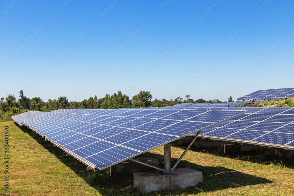 solar cells in solar power plant turn up skyward absorb the sunlight from the sun use light energy to generate electricity on blue sky 