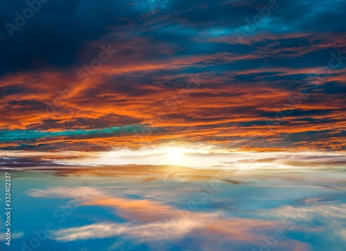 Beautiful heavenly landscape with sun in clouds. © yaalan