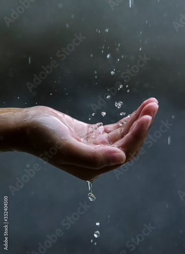 Palm hands with water splash