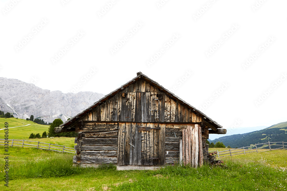 wood mountain house shed with green grass