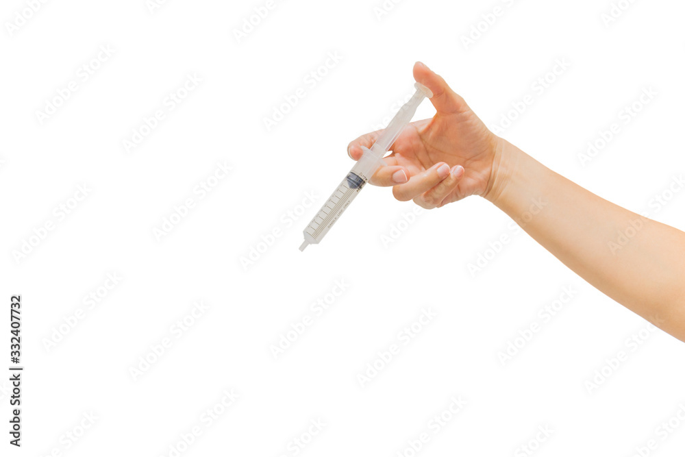 Hand holding syringe isolated on white background.