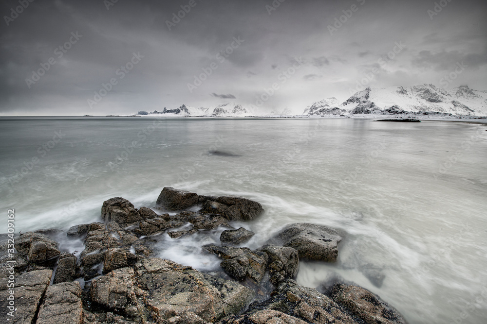 Dark winter landscape of sea shore