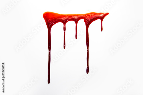 A blood spatter. A blood flowing down. Bloody pattern. Concepts of blood can be used in design