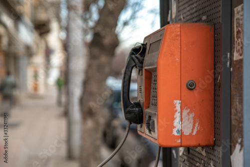 Wallpaper Mural old red pay phone on city street Torontodigital.ca