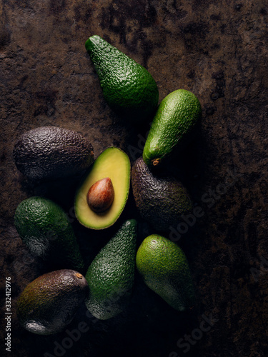 Overhead view of avocados on table