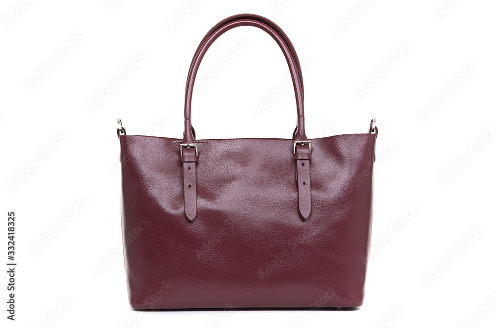 expensive red female leather bag on a handle isolated on a white background expensive red female leather bag on a handle isolated on a white background