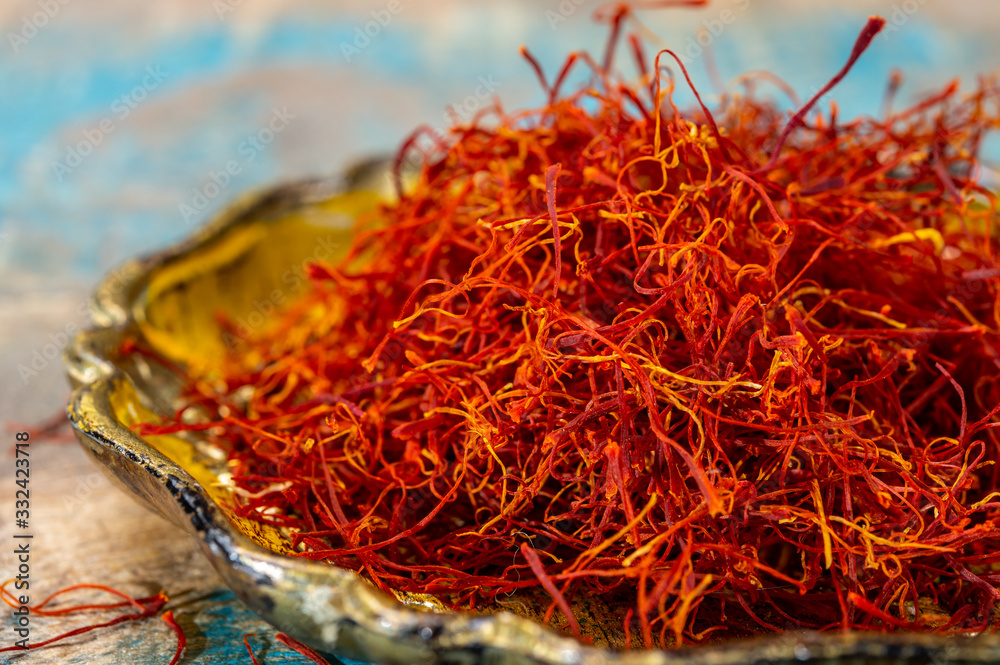 Naklejka premium Real red dried shaffron spice close up
