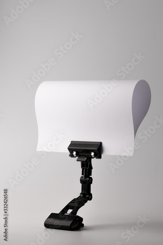 Empty white paper with black stand