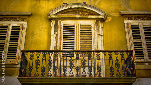 Beautiful windows or doors in a variety of colors and forms with walls textures and old details.