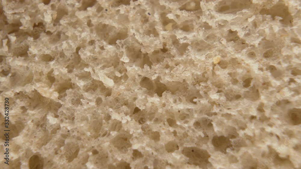 Sliced natural organic white or brown bread macro shot texture background Sliced natural organic white or brown bread macro shot texture background