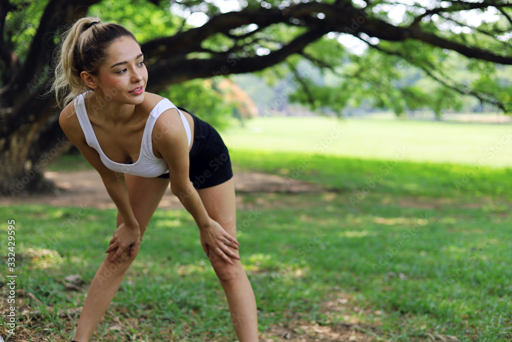 Happiness young woman exercise yoga in the morning at garden park. Happiness young woman exercise yoga in the morning at garden park.