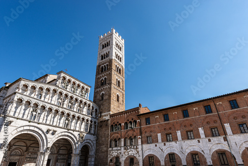 Lucca, facade and bell tower of the Cathedral of San Martino (Saint Martin), in Romanesque Gothic style, XI century. Tuscany, Italy, Europe