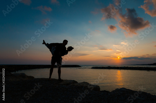 Fototapeta Naklejka Na Ścianę i Meble -  Couple during sunset Side Turkey
