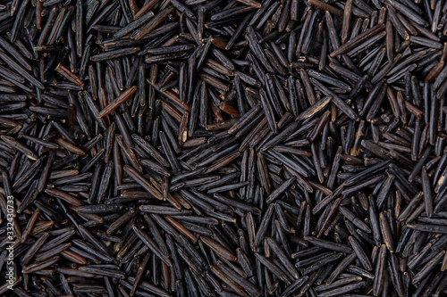 Wild rice. Rice texture macro. Natural rice background and texture