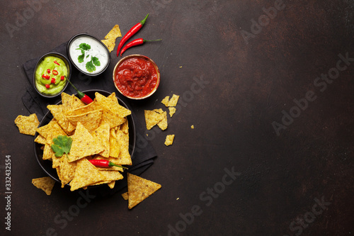 Mexican nachos chips and sauces photo