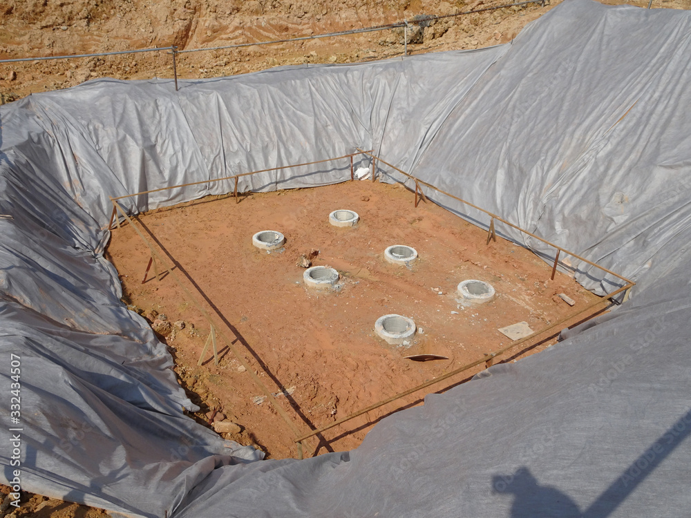 Bore pile cut to level by the construction workers. Next stage is