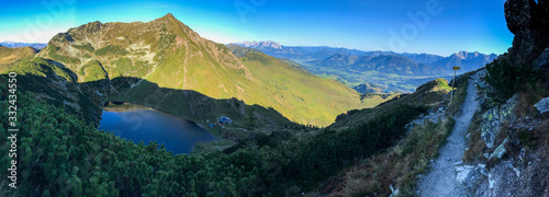 Fototapeta Naklejka Na Ścianę i Meble -  Panoramic view at the wild lake, epic landscape, blue sky, shadow, pathway