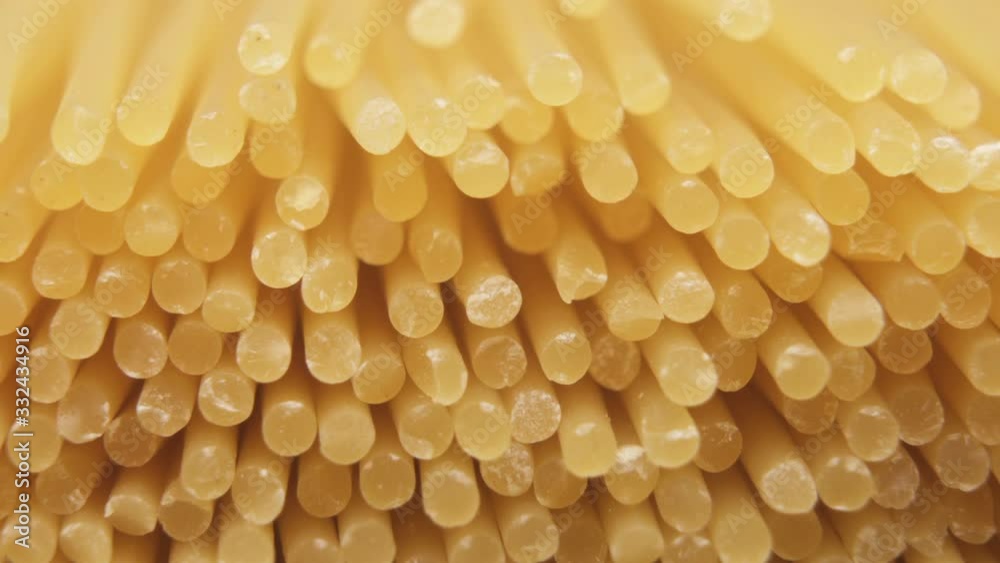 Uncooked pasta spaghetti macro shot Uncooked pasta spaghetti macro shot