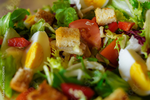 Salad in the morning. Salad with egg, lettuce, tomato, croutons, pepper. Diet, proper nutrition, perfect breakfast.