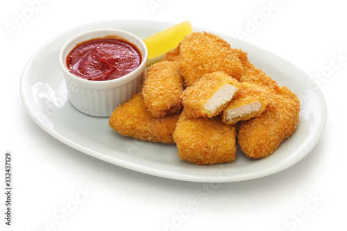 homemade chicken nuggets isolated on white background photo