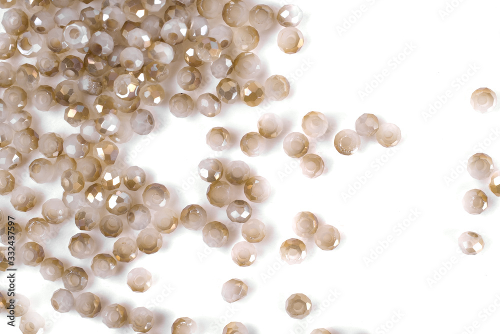 close up multi colored beads heap isolated on white close up multi colored beads heap isolated on white
